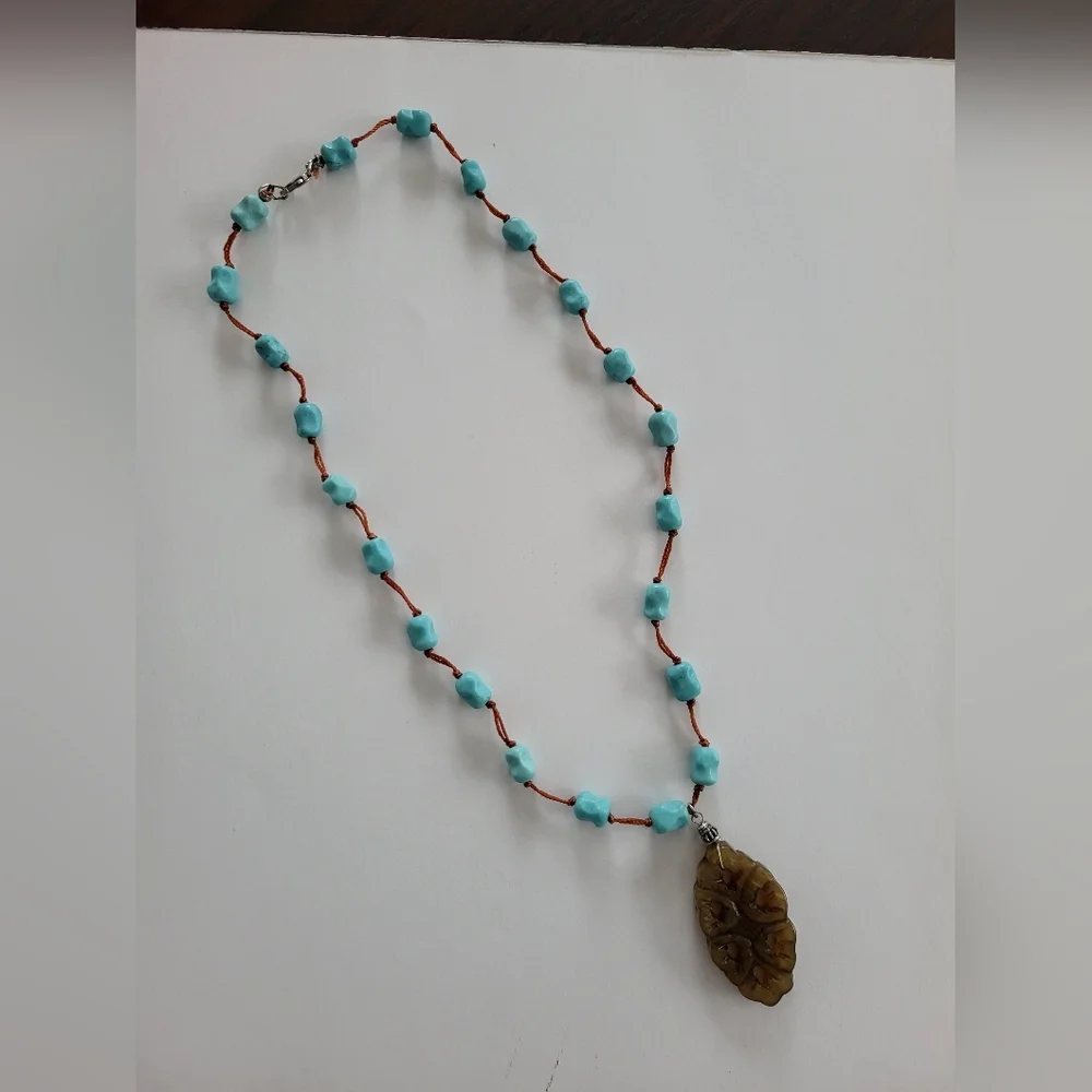 Necklace featuring turquoise nugget beads wth silver clasp. - Picture 2 of 7